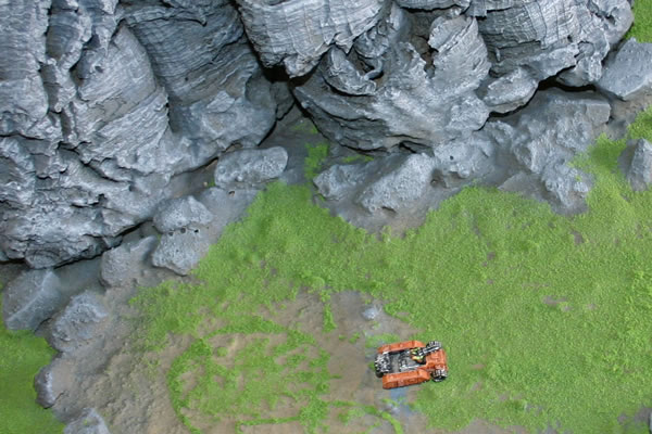 This is a close-up of the Ork vehicle in the terrain.