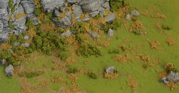 I have added some more Woodland Scenics foilage to my grassy scenery board.