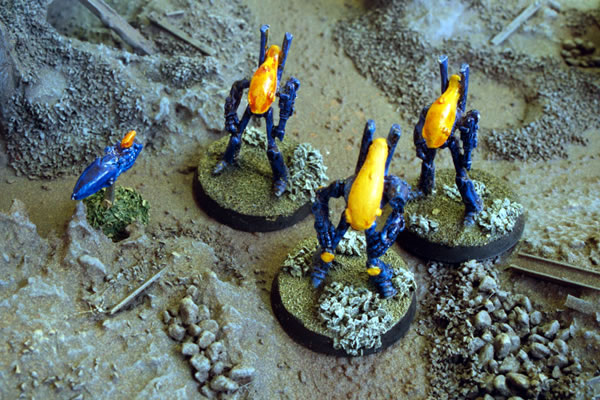 Eldar Dreadnoughts supported by Jetbikes stand readyto advance.